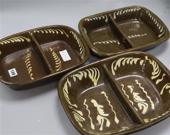 Three Victorian slipware two division baking dishes